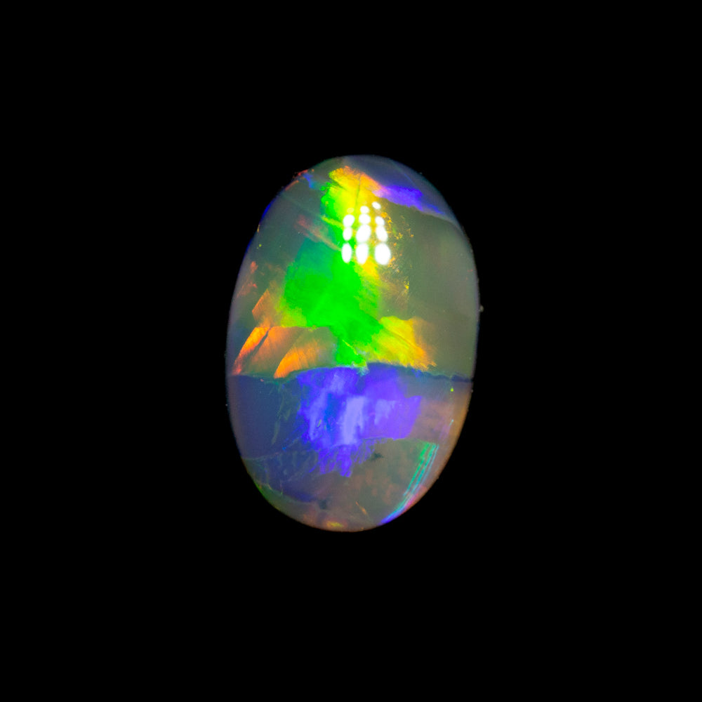 0.63 ct dark opal 7.9x5.3x2.3mm