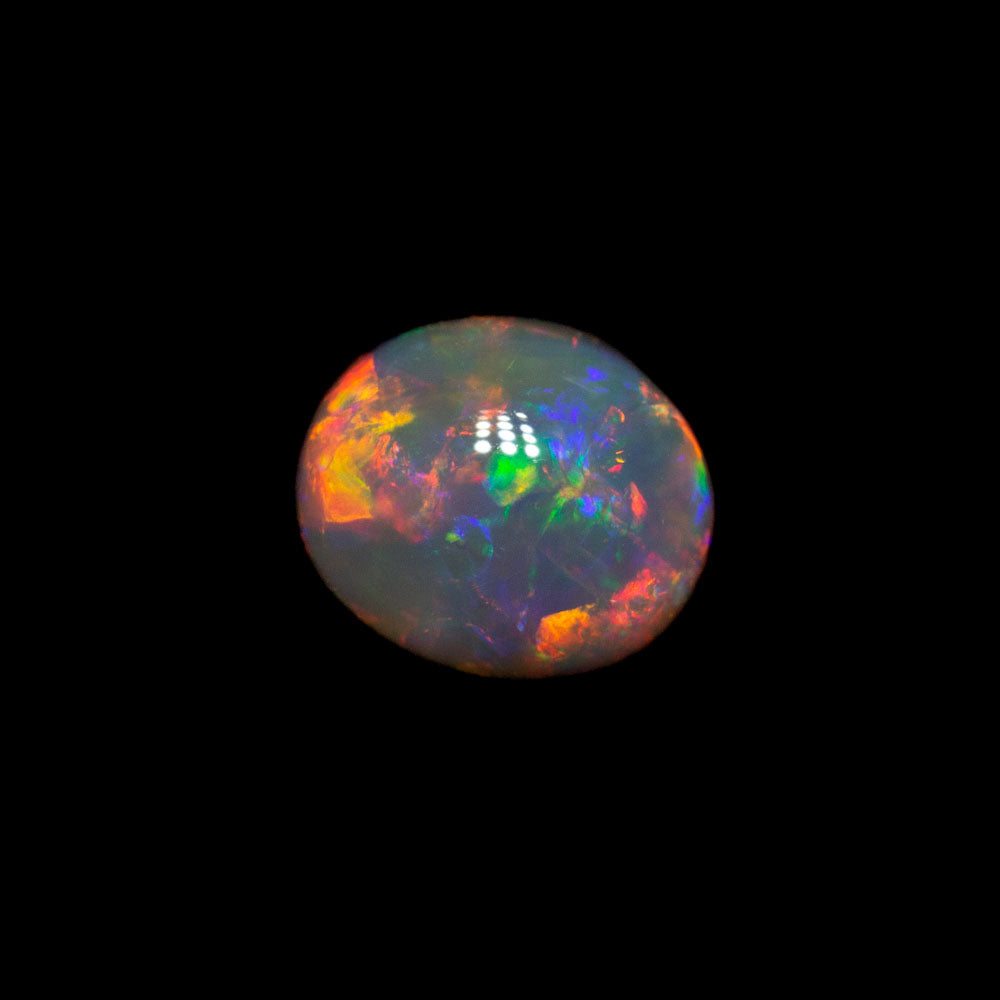 0.63 ct gem dark opal 5.7x5x3.4mm