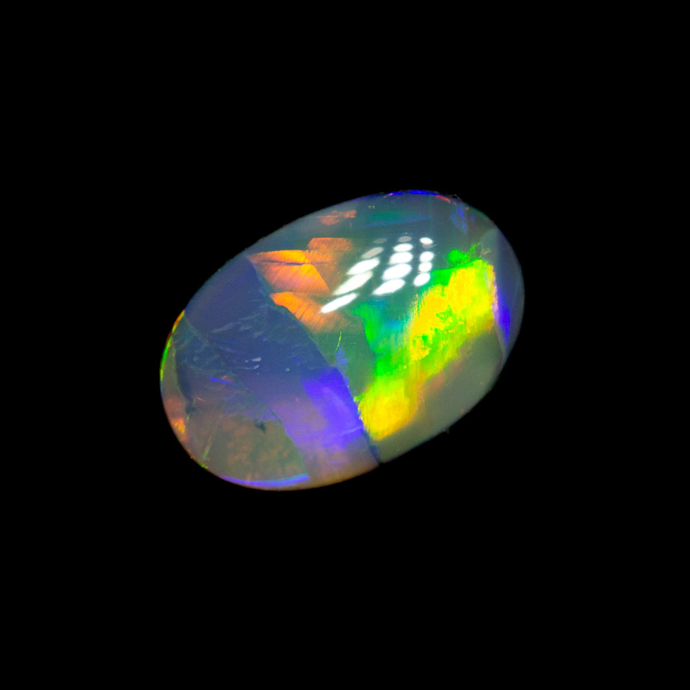 0.63 ct dark opal 7.9x5.3x2.3mm