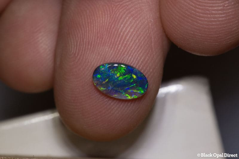 0.63 ct black opal 9x5.5x1.5mm