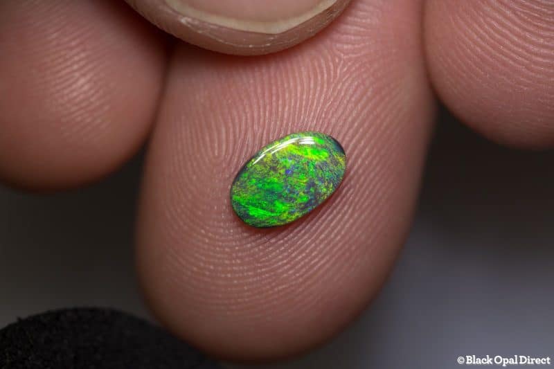 0.63 ct dark opal 8.5x6x1.5mm