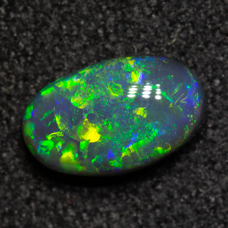 0.64 ct black opal 7.1x4.5x3.1mm