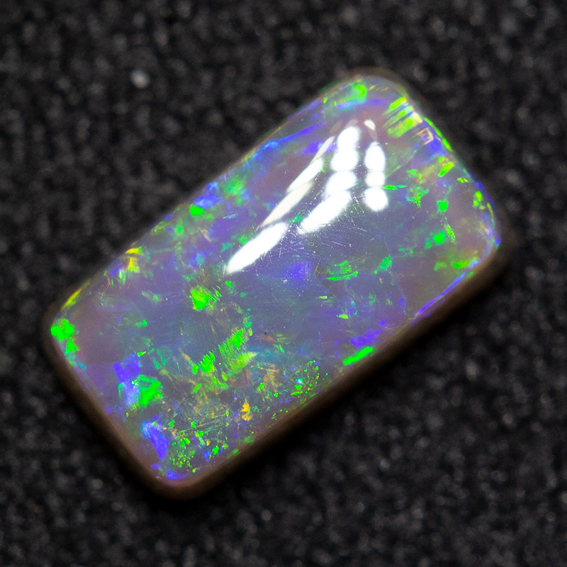 0.64 ct dark opal 7.2x4x2.6mm