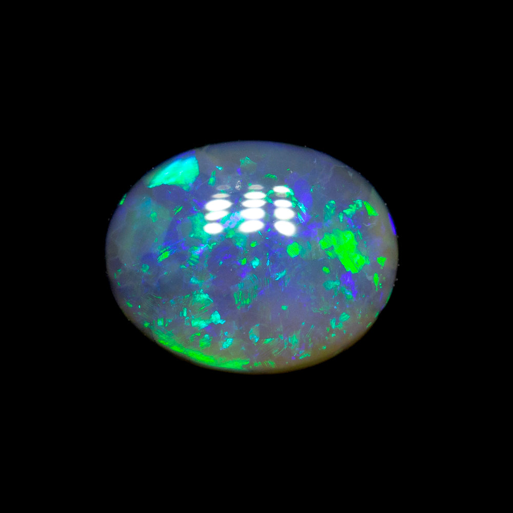 0.64 ct black opal 6.7x5.3x2.6mm
