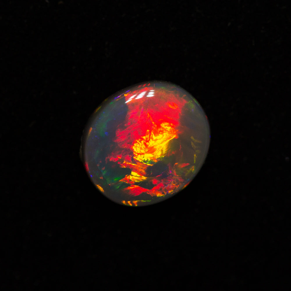 0.64 ct gem black opal 6.3x5.5x2.6mm