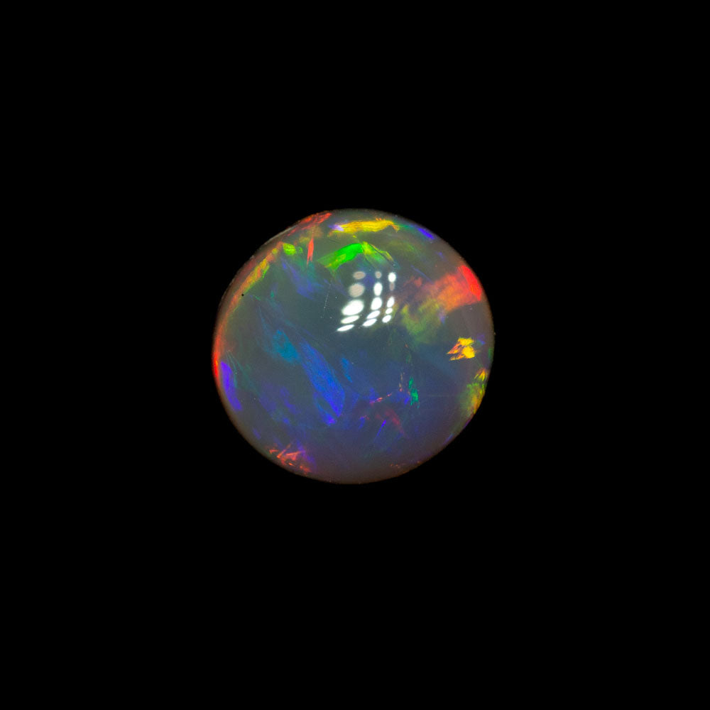 0.65 ct black crystal opal 5.9x5.6x3.3mm