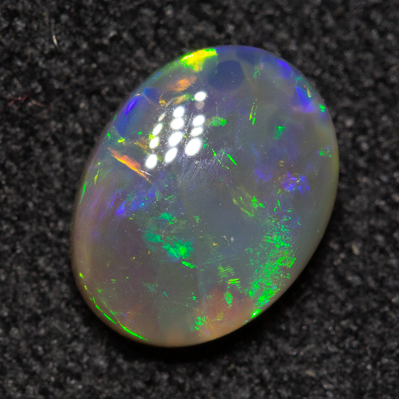 0.65 ct crystal opal 7x5.4x2.8mm