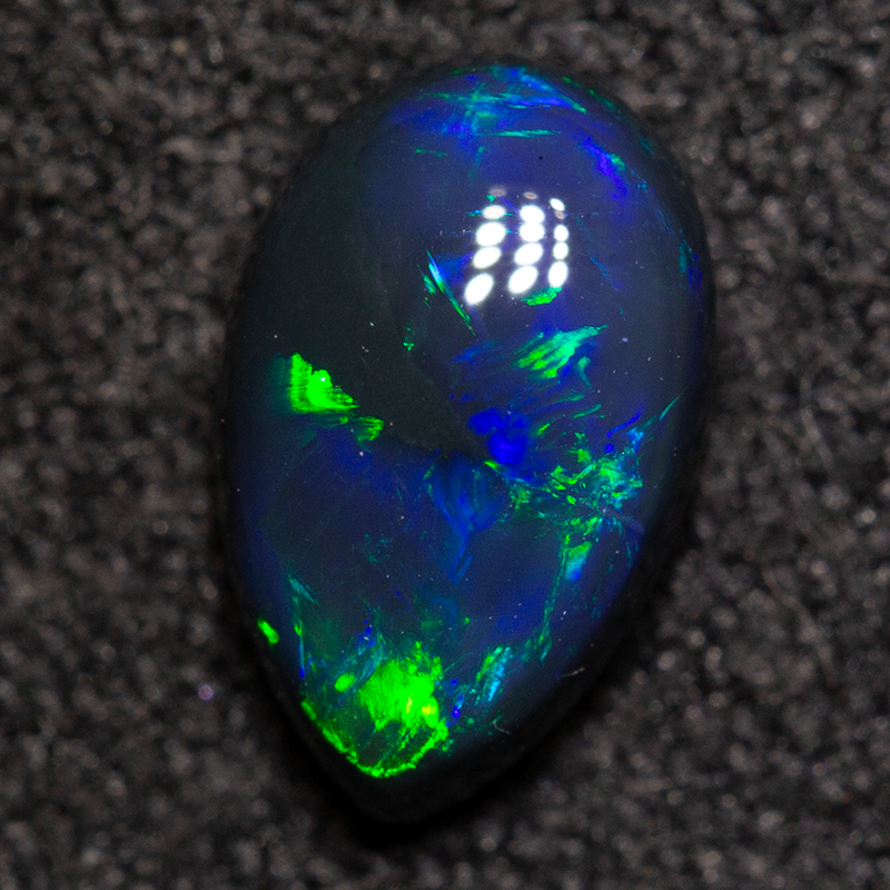 0.65 ct black opal 7.4x4.8x2.9mm