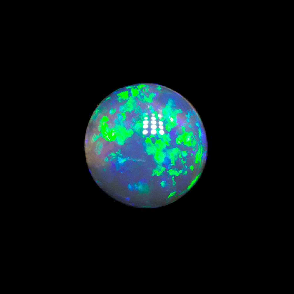 0.65 ct black opal 5.8x5.6x3mm