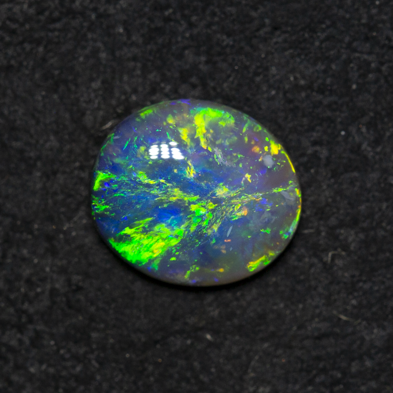 0.65 ct black opal 7.1x6.2x2.5mm