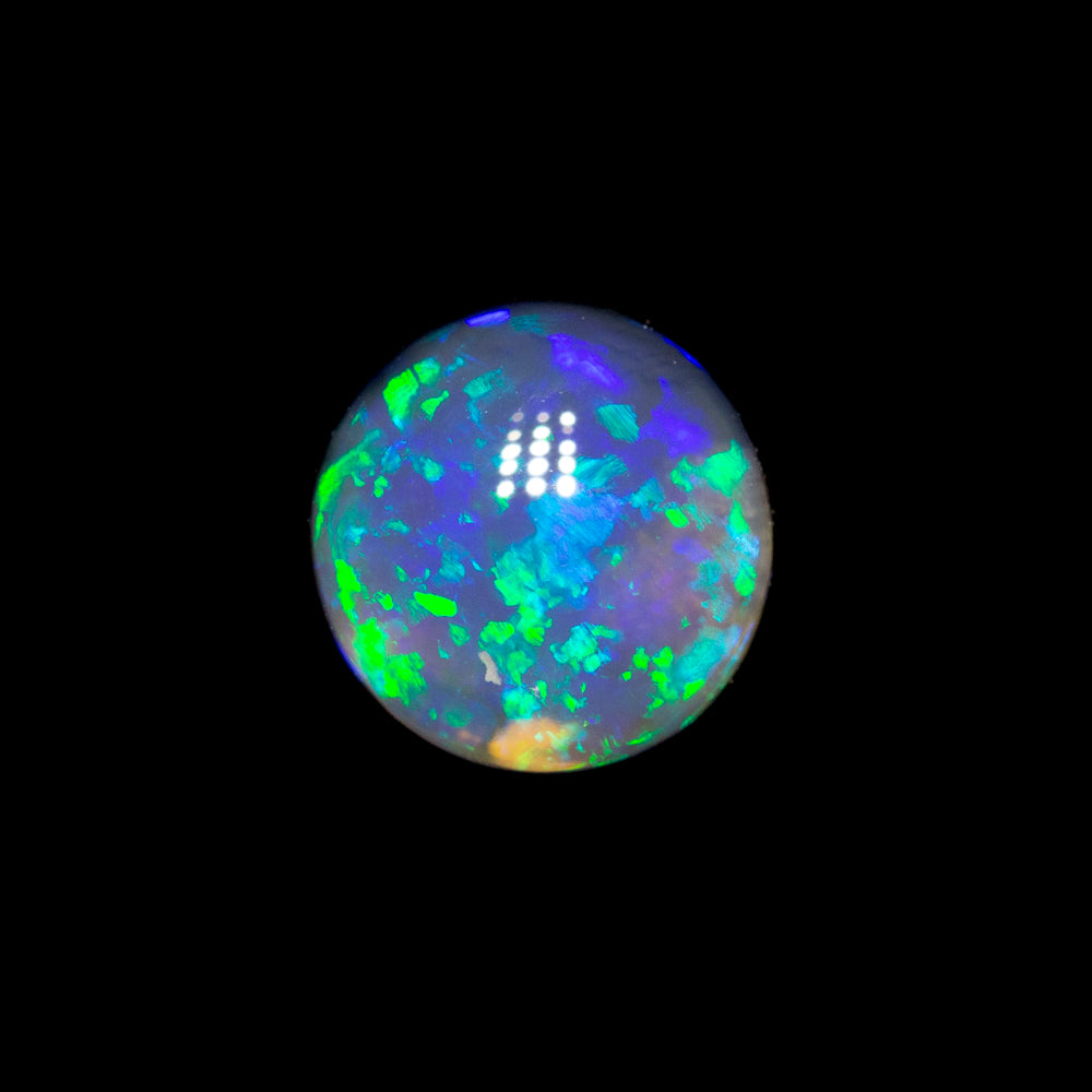 0.65 ct black opal 5.8x5.6x3mm