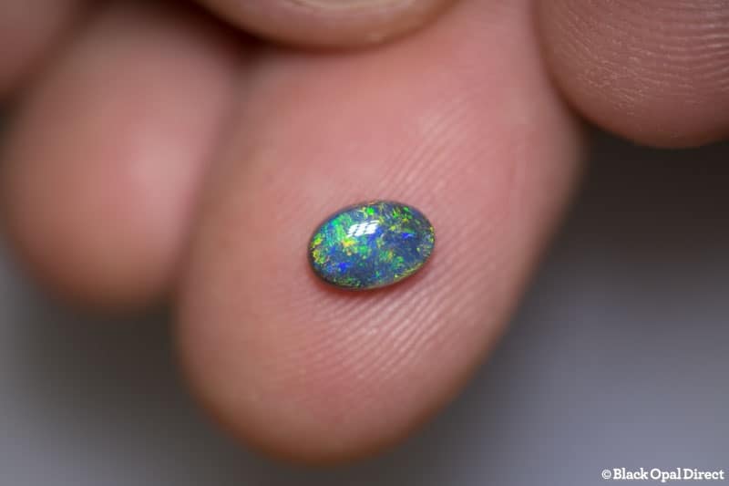 0.65 ct black opal 6.5x4.5x3mm