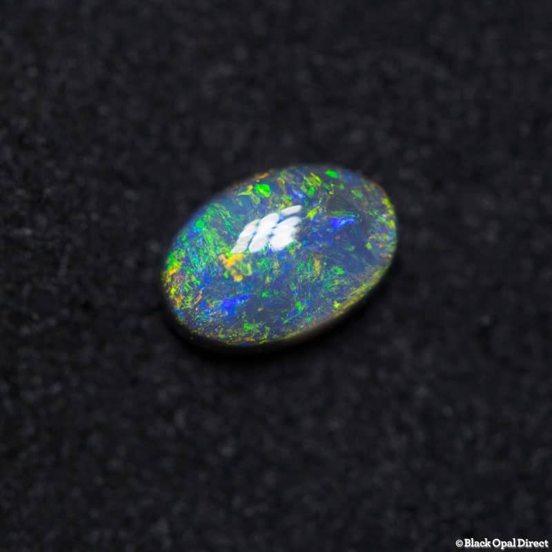 0.65 ct black opal 6.5x4.5x3mm