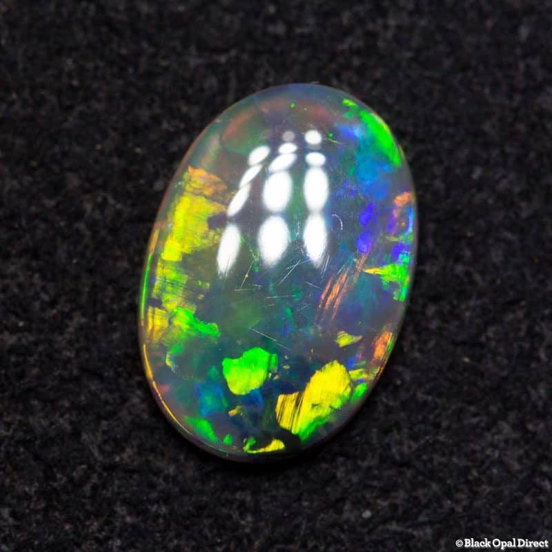 0.65 ct dark crystal opal 8x6x1.5mm