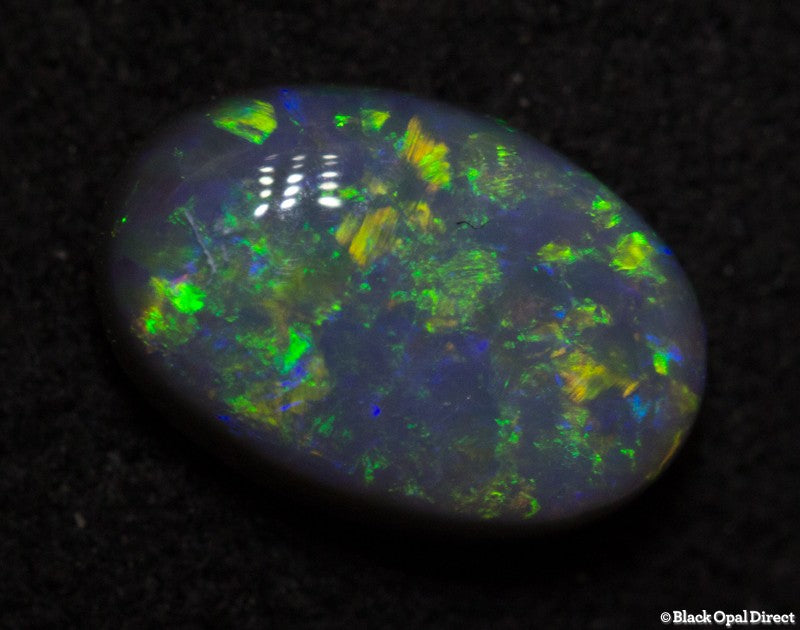 0.65 ct semi black opal 7x5x2.5mm