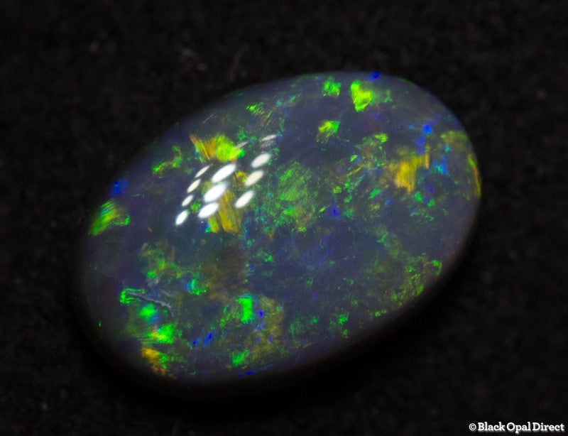 0.65ct semi black opal1