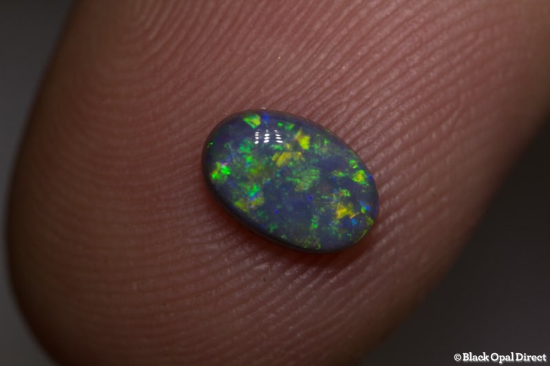 0.65 ct semi black opal 7x5x2.5mm