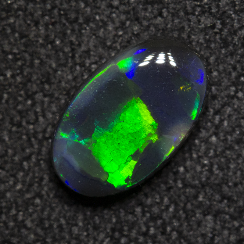 0.66 ct black opal 7.7x4.7x2.5mm