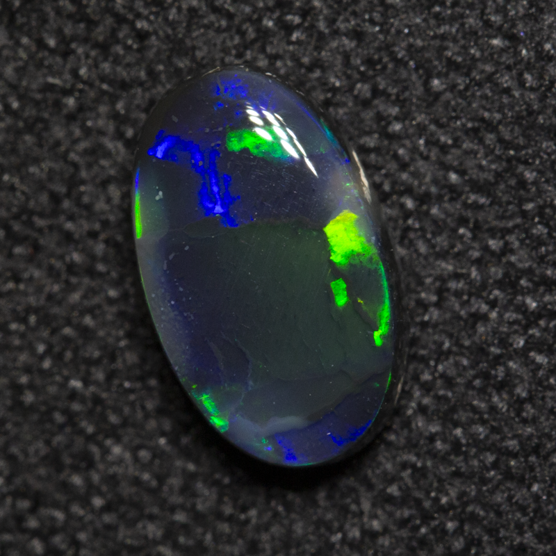 0.66 ct black opal 7.7x4.7x2.5mm