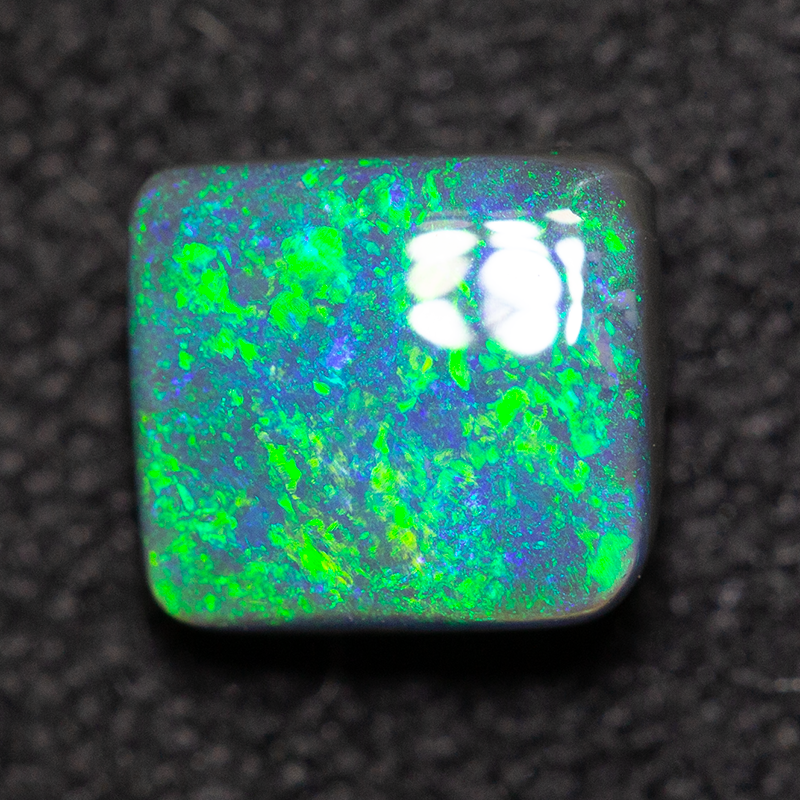 0.67 ct black opal 5.5x5x3mm