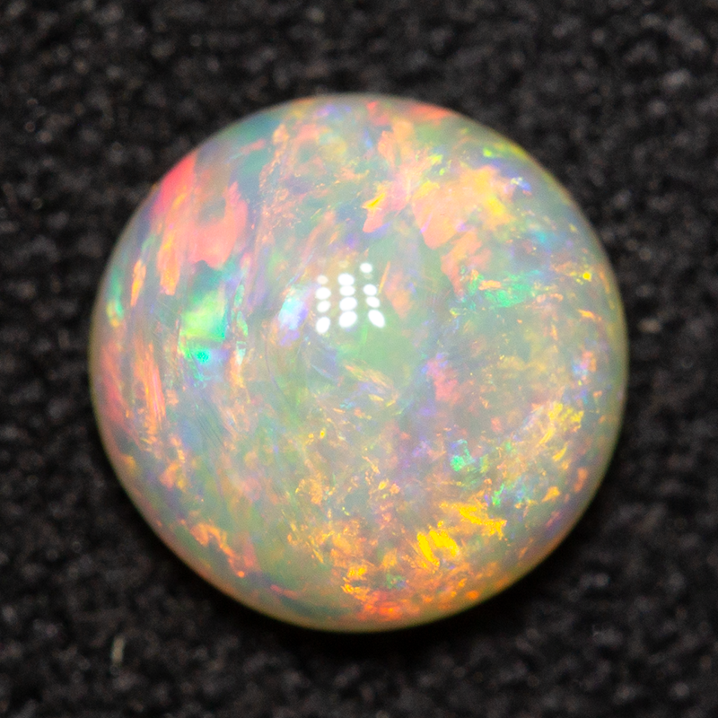 0.67 ct white opal 6.1x6.1x3mm