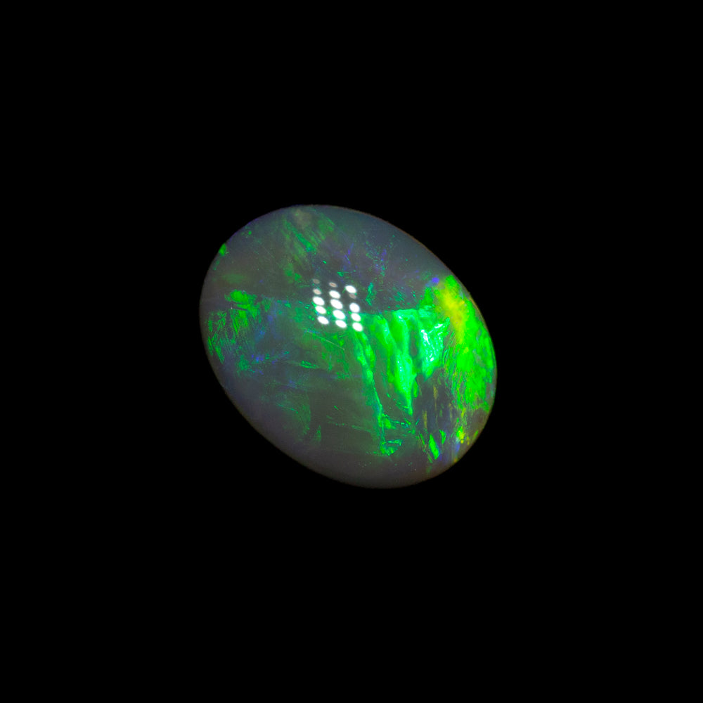0.67 ct black opal 6.7x5.3x3mm