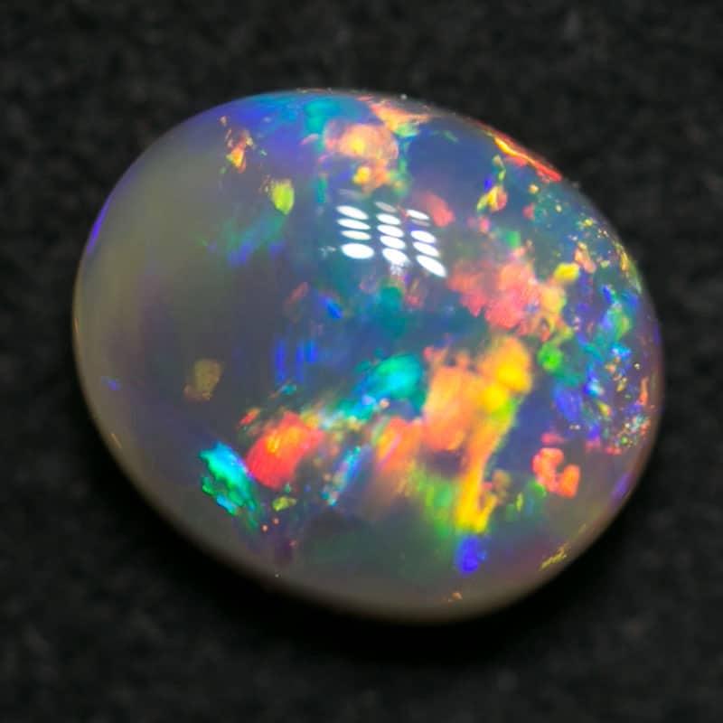 0.67 ct dark crystal opal 6x5x3mm