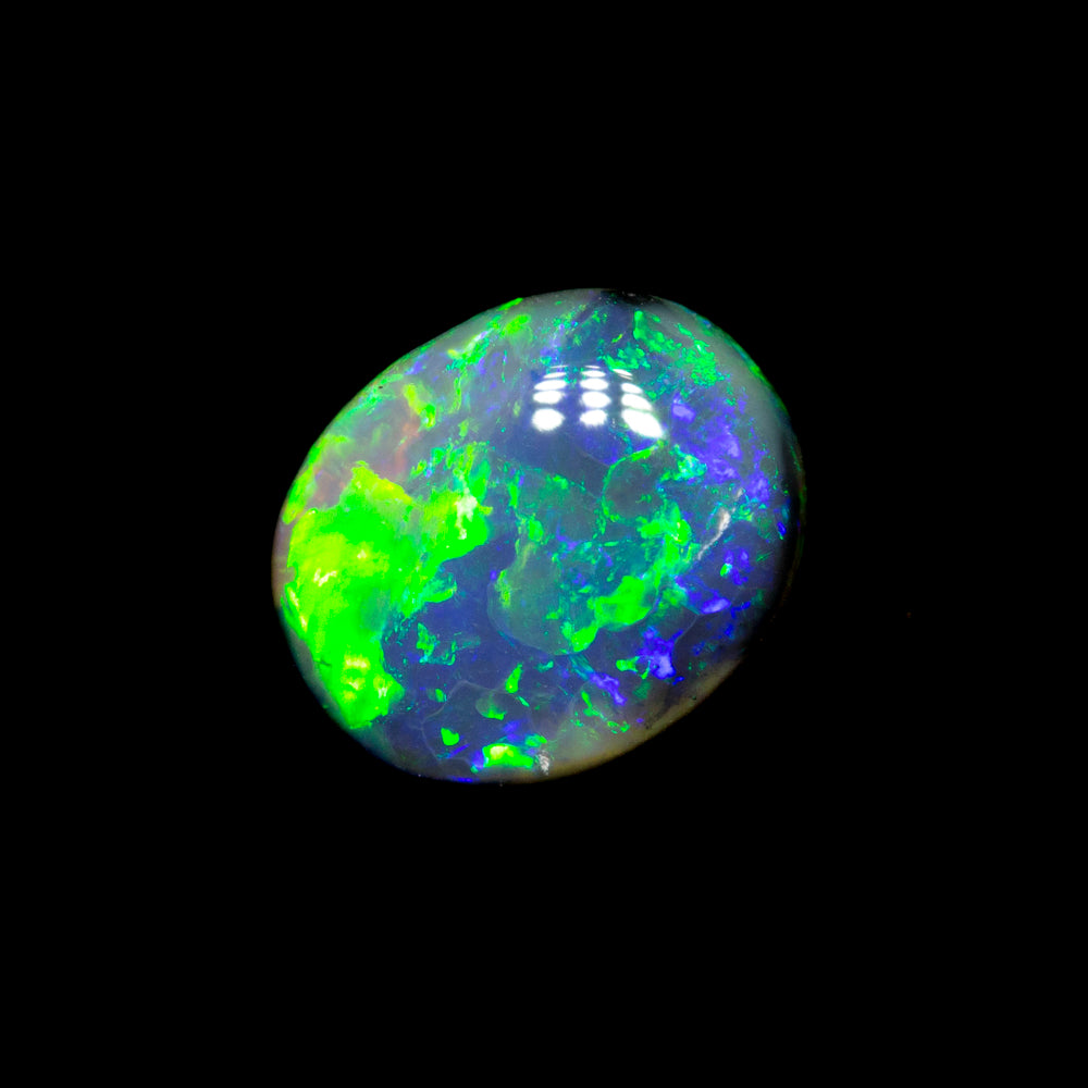 0.68 ct black opal 7.1x5.8x2.7mm