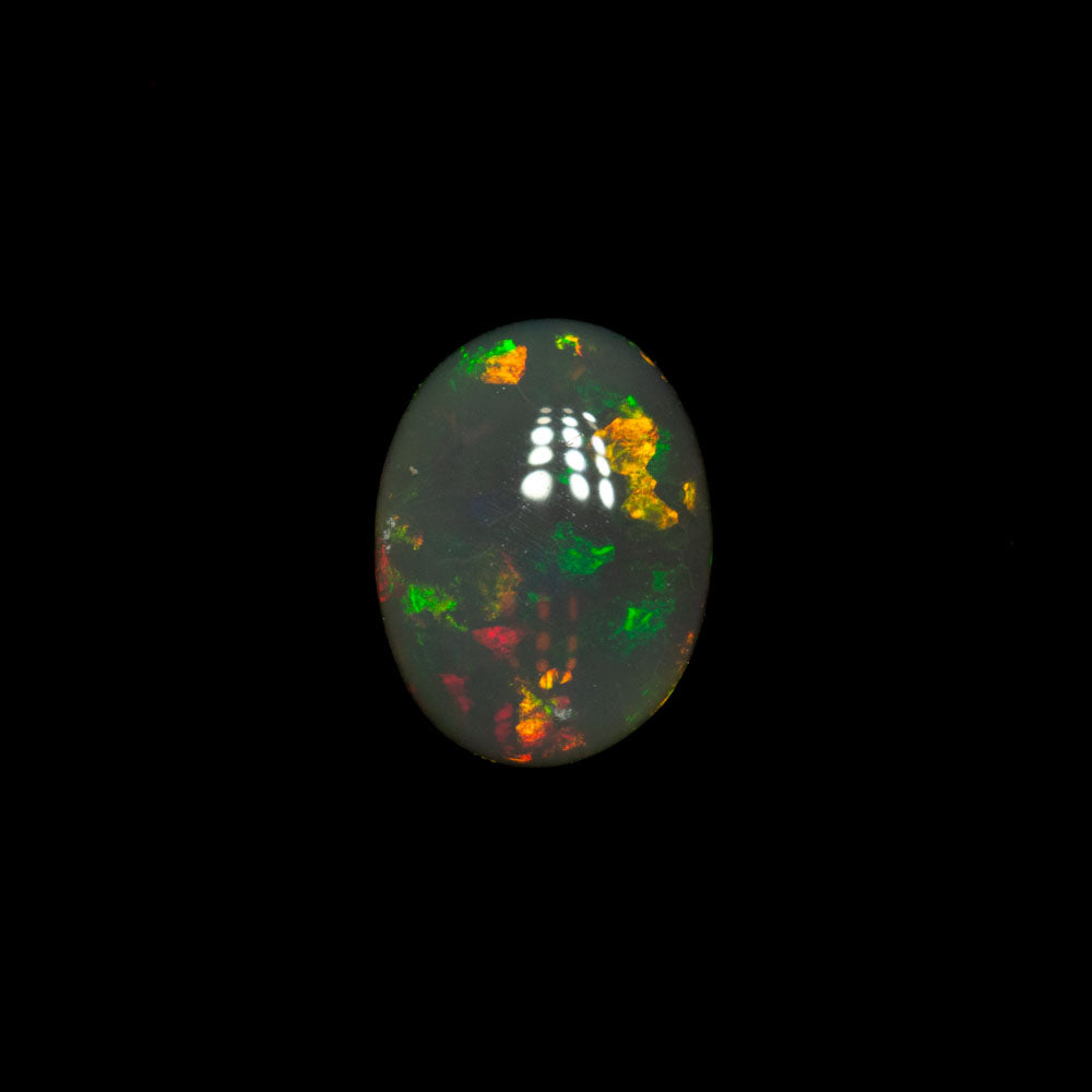 0.69 ct double-sided black opal 6.9x5.2x2.7mm
