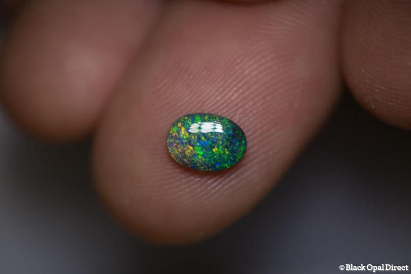 0.69 ct black opal 7.5x5x2mm