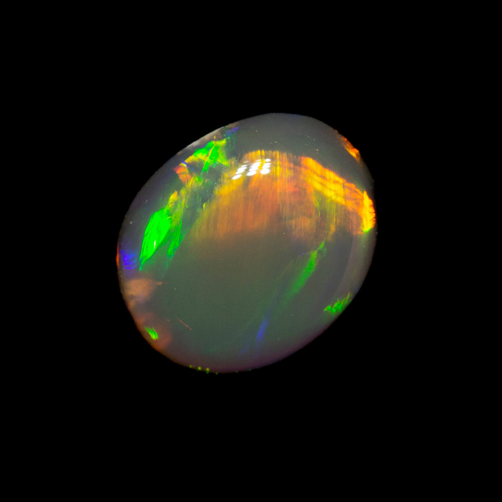 0.70 ct black opal 6.7x5.6x3mm