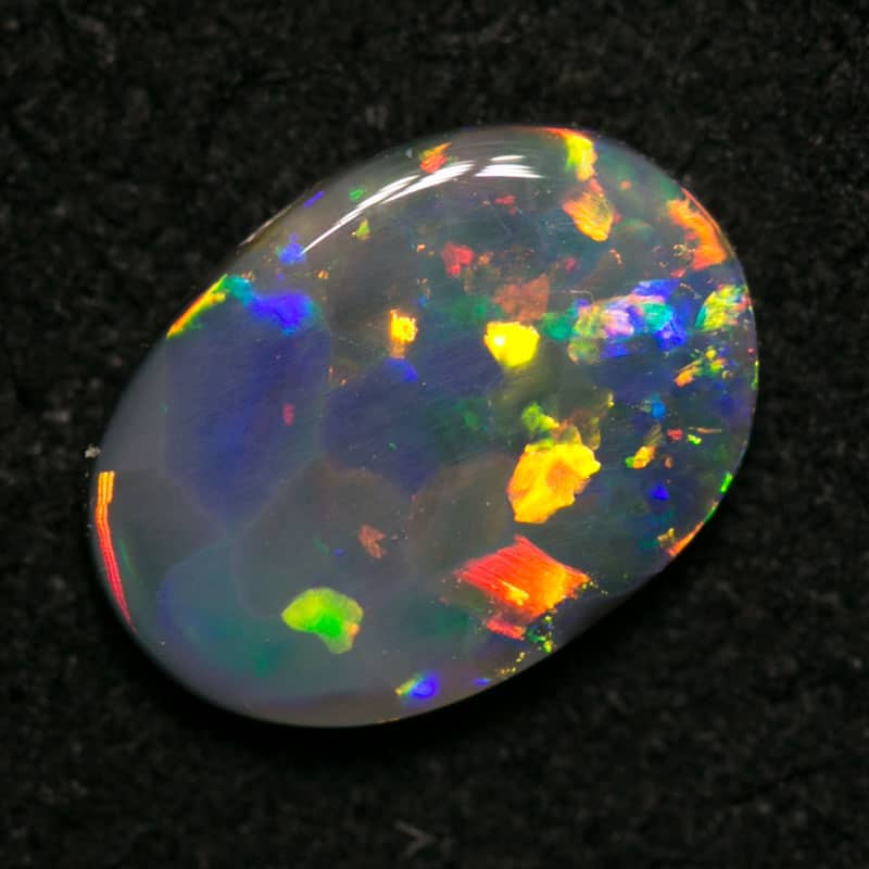 0.70 ct black opal 8x6x1.5mm