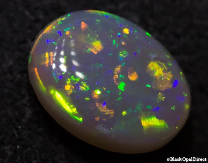 0.70 ct semi black opal 7x5.5x3mm