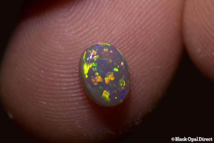 0.70 ct semi black opal 7x5.5x3mm