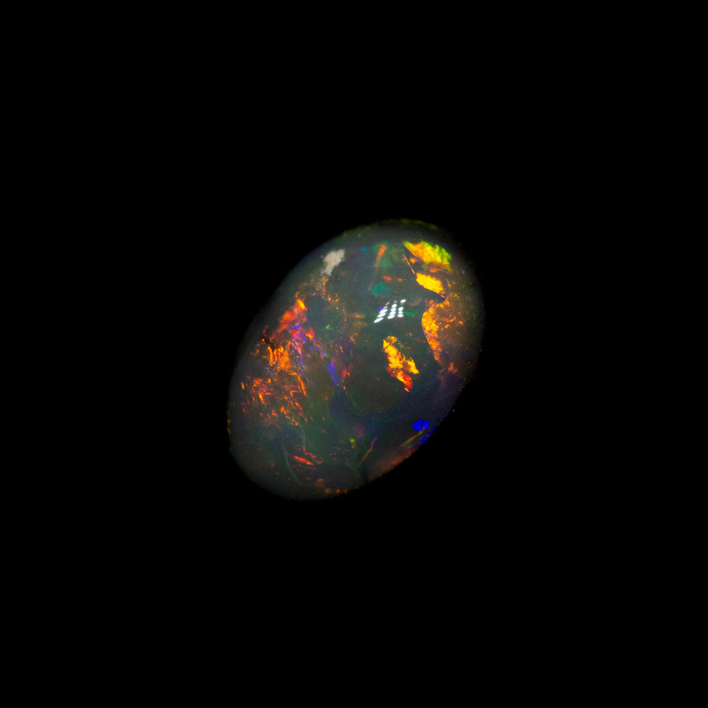0.71 ct black opal 7x4.7x3.3mm
