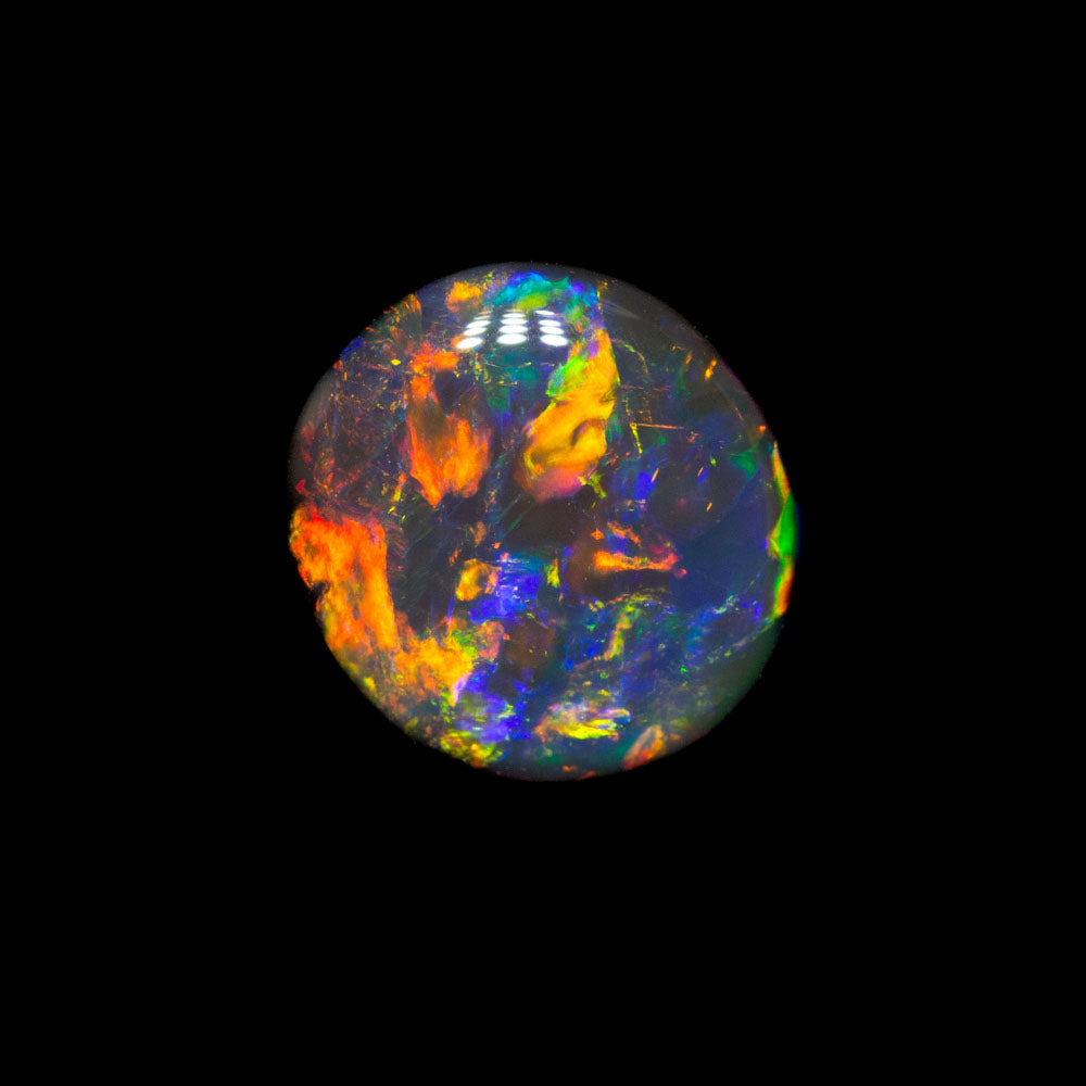 0.71 ct gem black opal 7.1x6.6x2.2mm