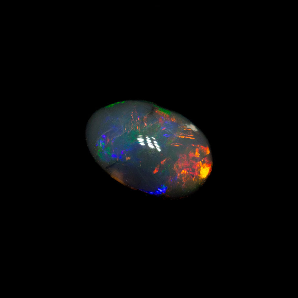 0.71 ct black opal 7x4.7x3.3mm
