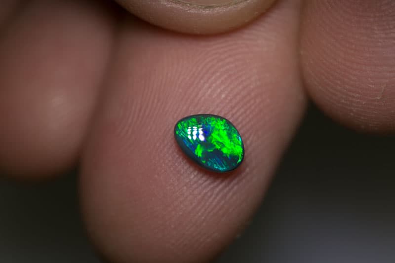 0.71 ct black opal 7x5x2.5mm