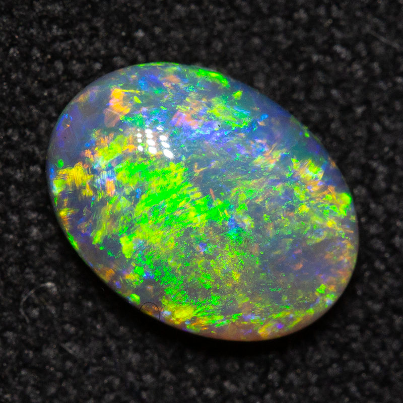0.72 ct dark opal 7.5x5.6x2.8mm