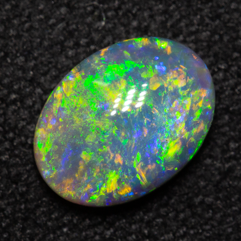 0.72 ct dark opal 7.5x5.6x2.8mm