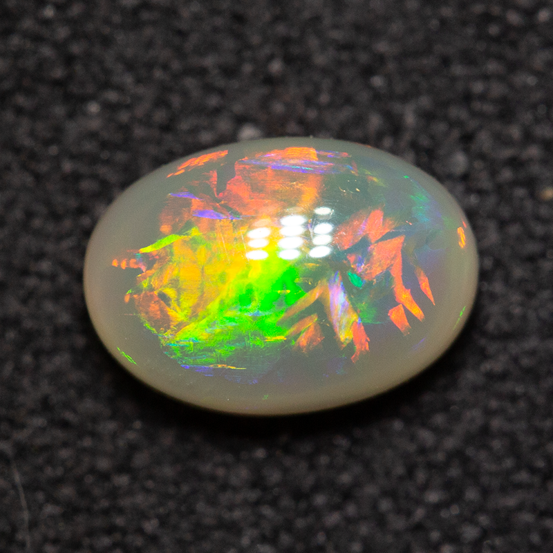 0.72 ct dark opal 7.1x5x3.1mm