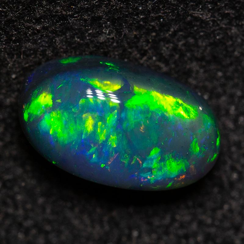 0.72 ct black opal 7.4x4.2x3.2mm
