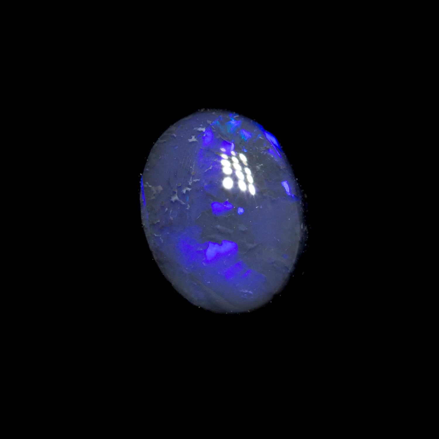 0.72 ct black opal 6.9x5.3x2.9mm