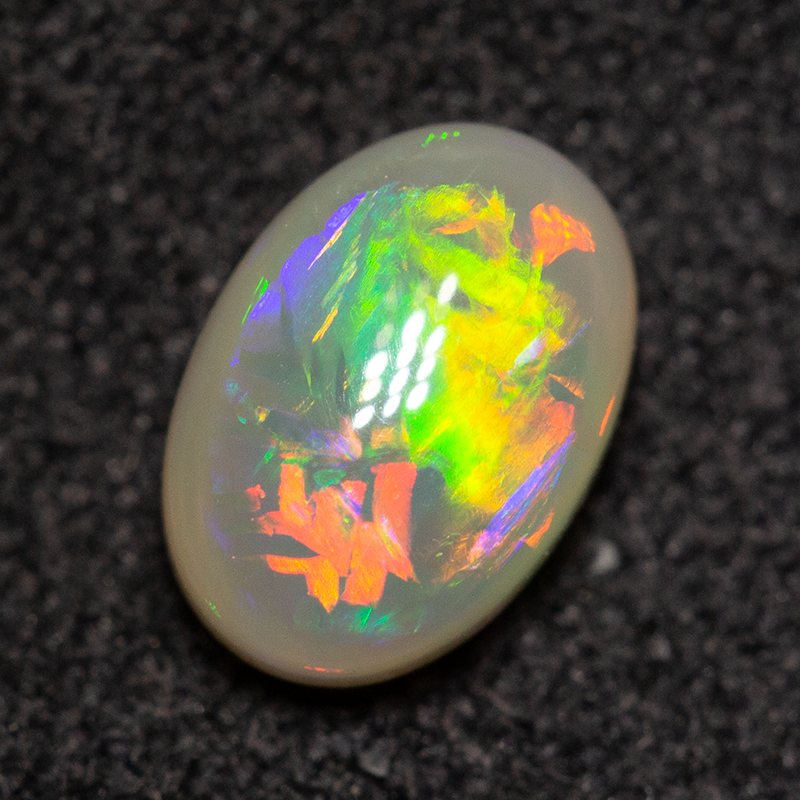 0.72 ct dark opal 7.1x5x3.1mm