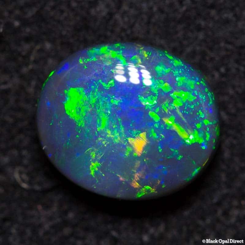 0.72 ct black opal 6.5x5.5x3mm