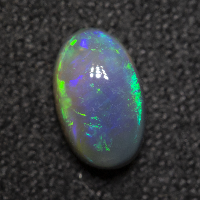 0.73 ct dark crystal opal 7.1x4.4x3.6mm
