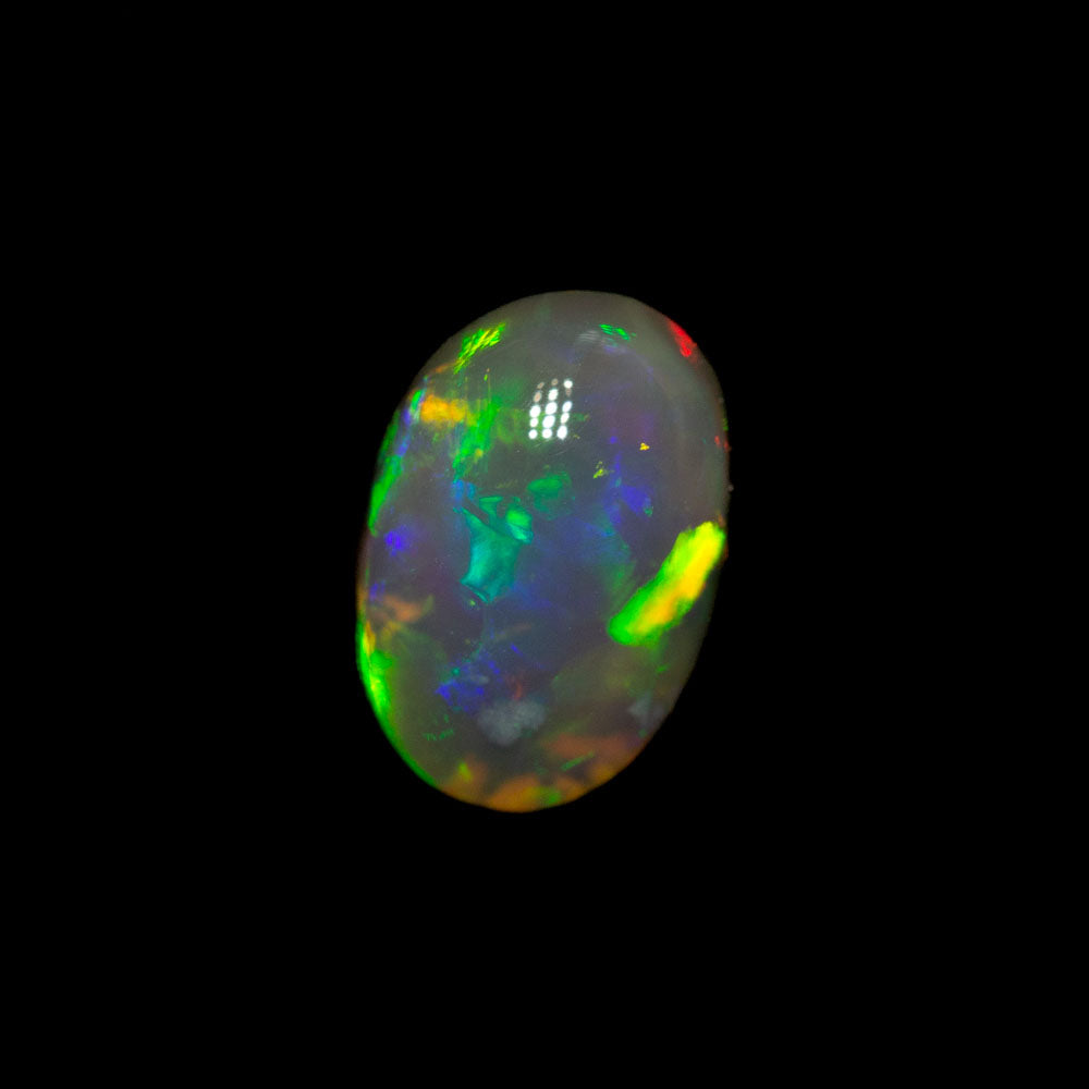 0.74 ct dark crystal opal 7.2x5x3.3mm