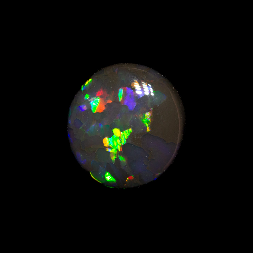 0.75 ct black opal 7.2x6.8x2.6mm