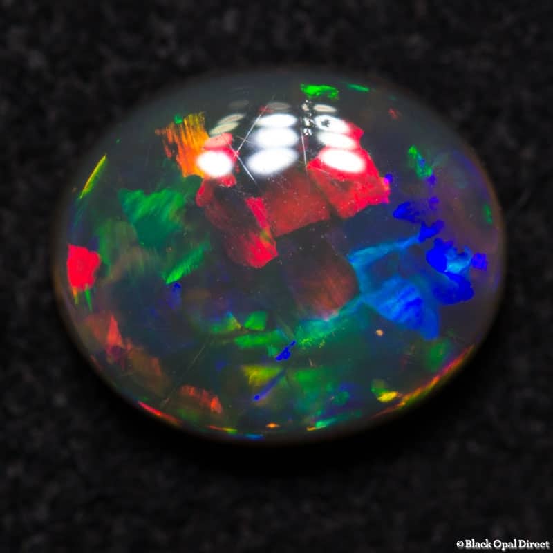 0.75 ct gem black crystal opal 7x6x2.5mm