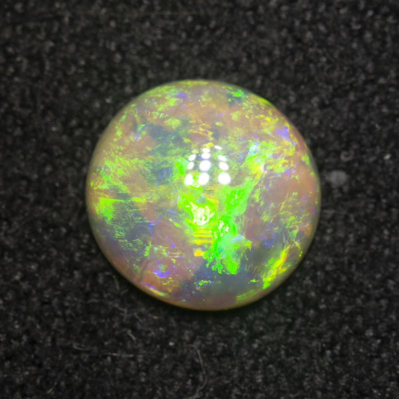 0.76 ct crystal opal 6.9x6.6x2.7mm